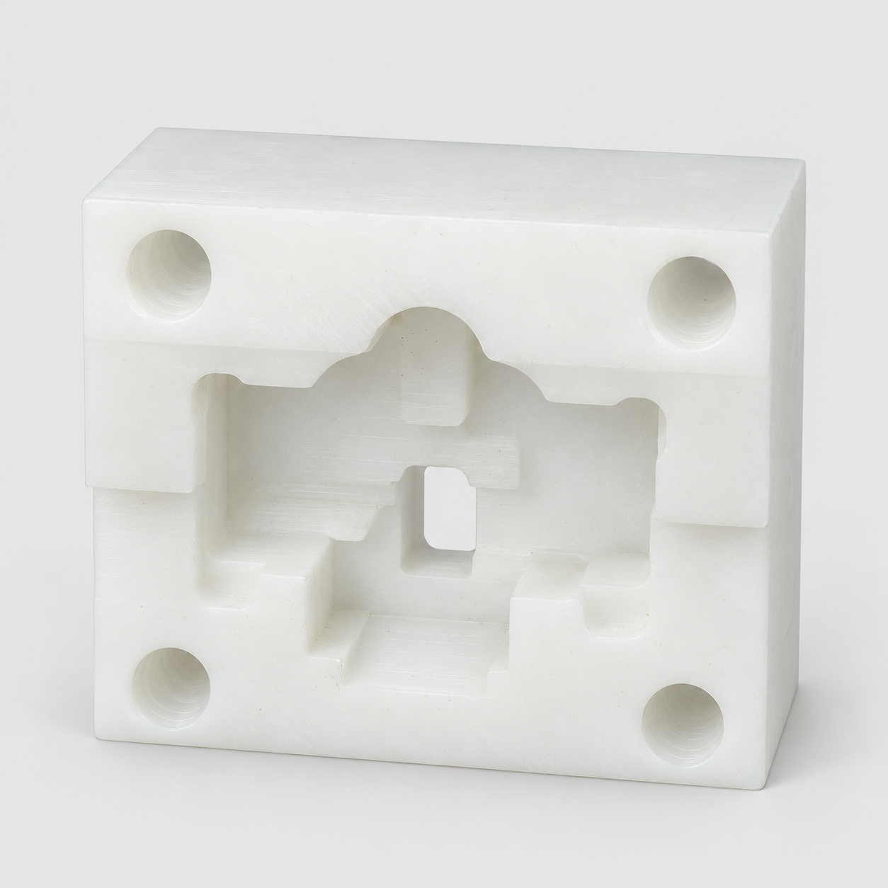 Stepped engineering-plastic locating block