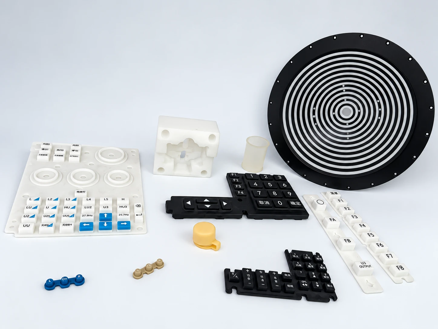 Screen-printed rubber keypads and shaped samples