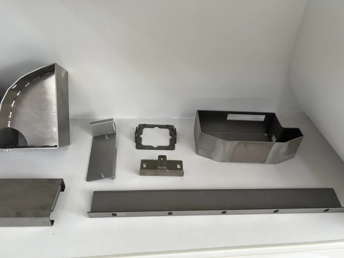Sheet metal and formed supporting parts